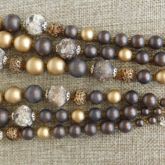 Vintage 3 strand bead necklace. Shades of brown and gold. Has moon glow beads - Picture 4 of 4